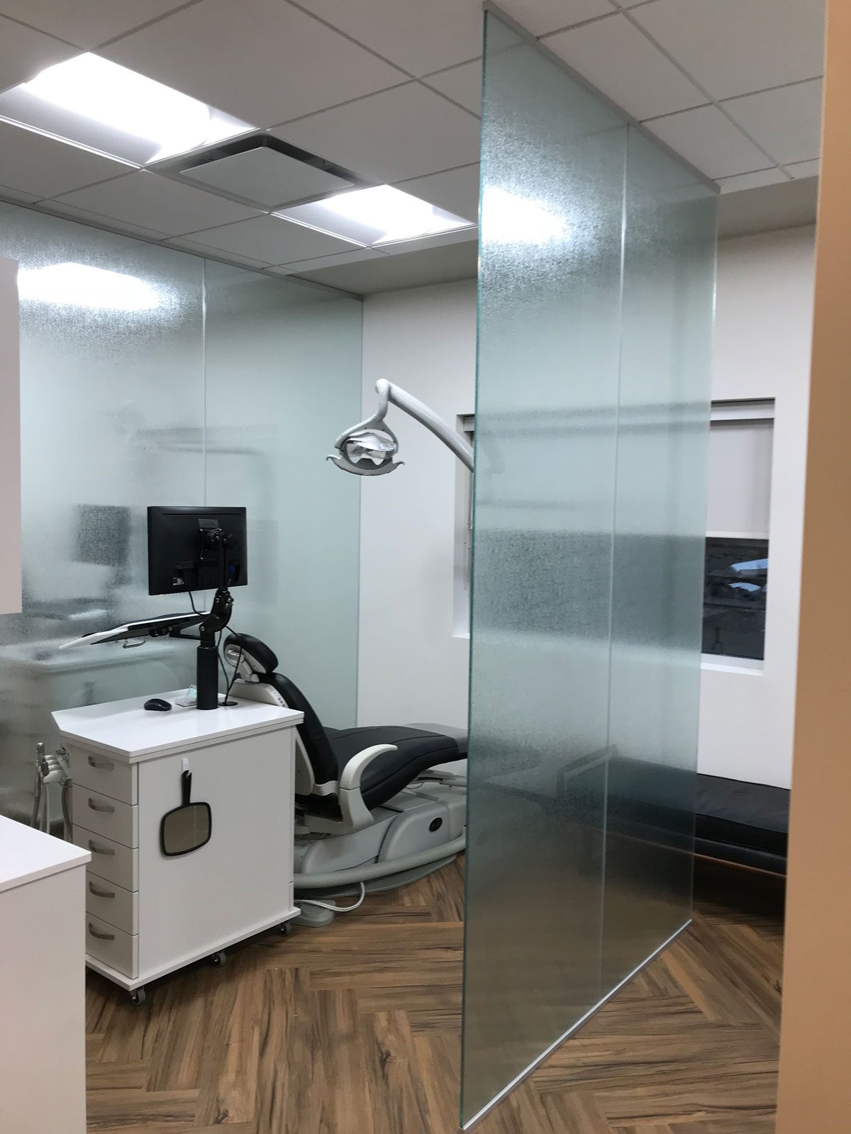 Dentist office with rain glass decorative window film.