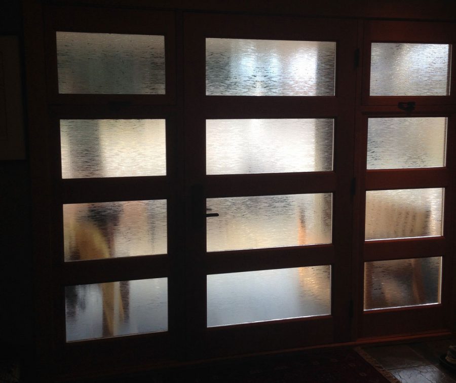 Rain Deco on windows and door in residential home.