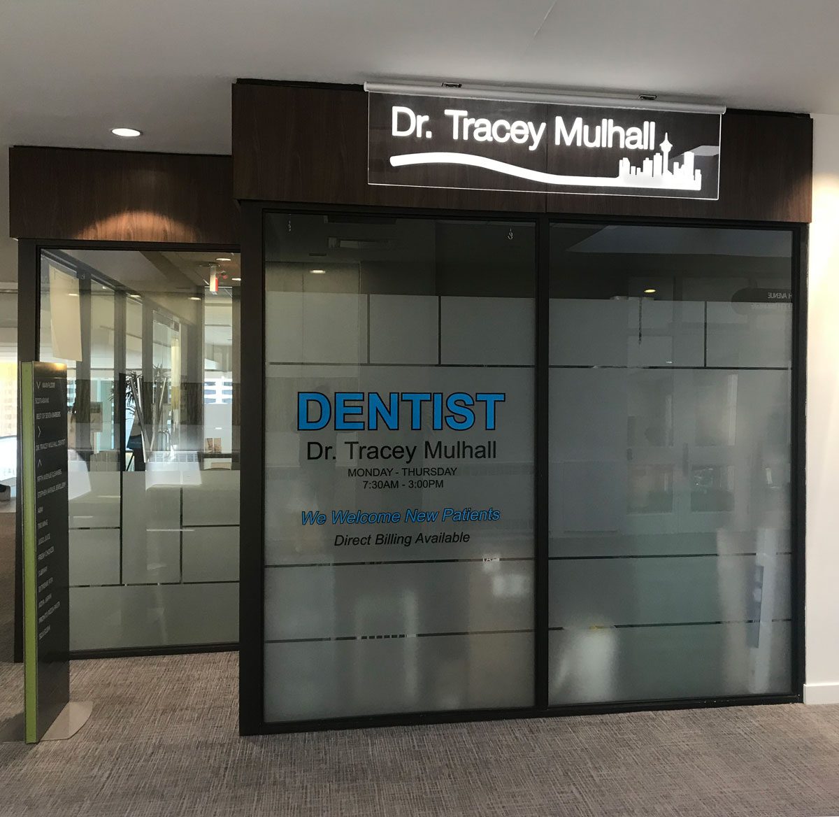 Custom window graphic with doctors name and information