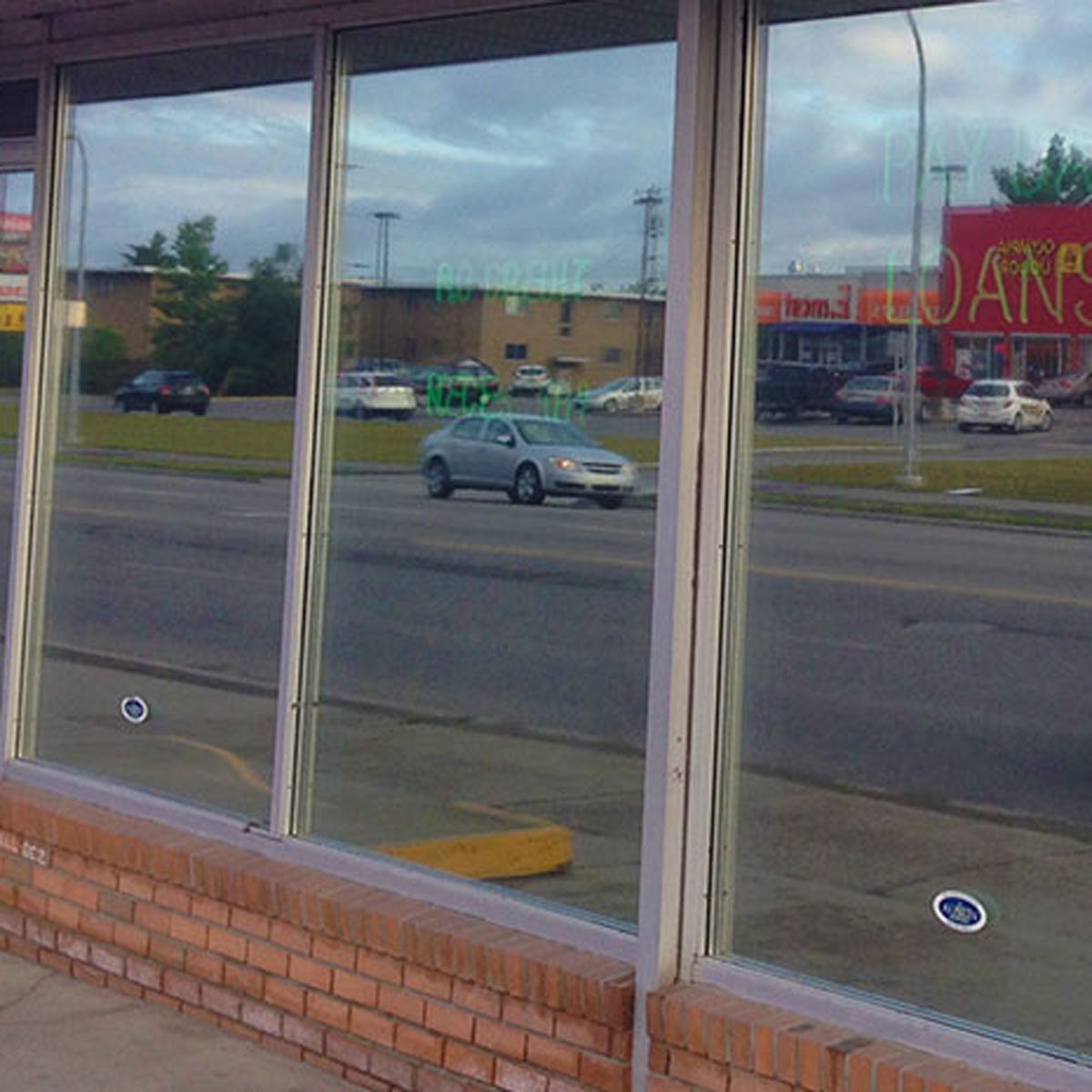 Store front with 12mm sliver security film.